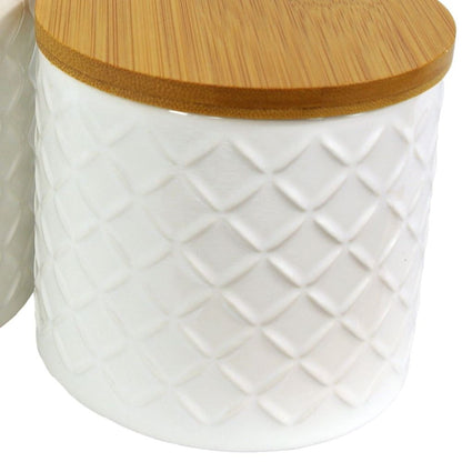 Set of Two Ceramic Jars Embossed Cream Canisters with Lids